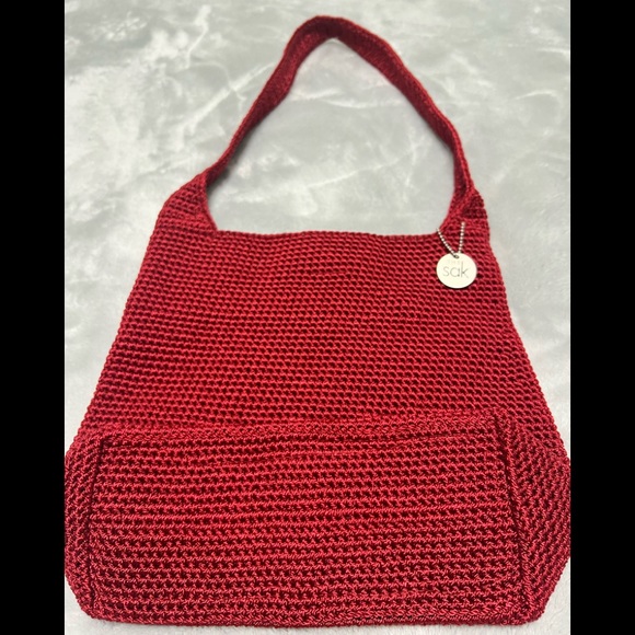 The Sak Woven Crochet Shoulder bag in red. - Picture 6 of 7